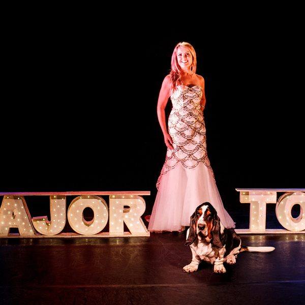 Victoria Melody on stage with her dog in Major Tom